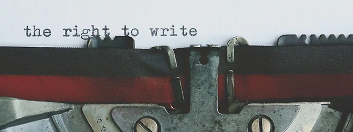 Typewriter typing "THE RIGHT TO WRITE"