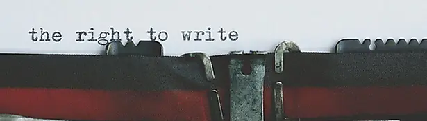 Typewriter typing "THE RIGHT TO WRITE"